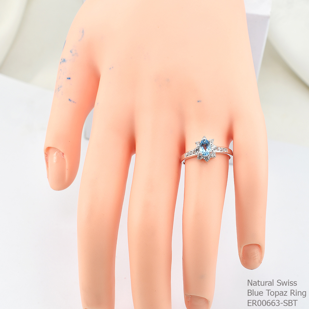 SKJewelryfactory แหวนพลอยสวิสบลูโทปาซแท้ แหวนพลอยล้อมเพชร ER00663-SBT