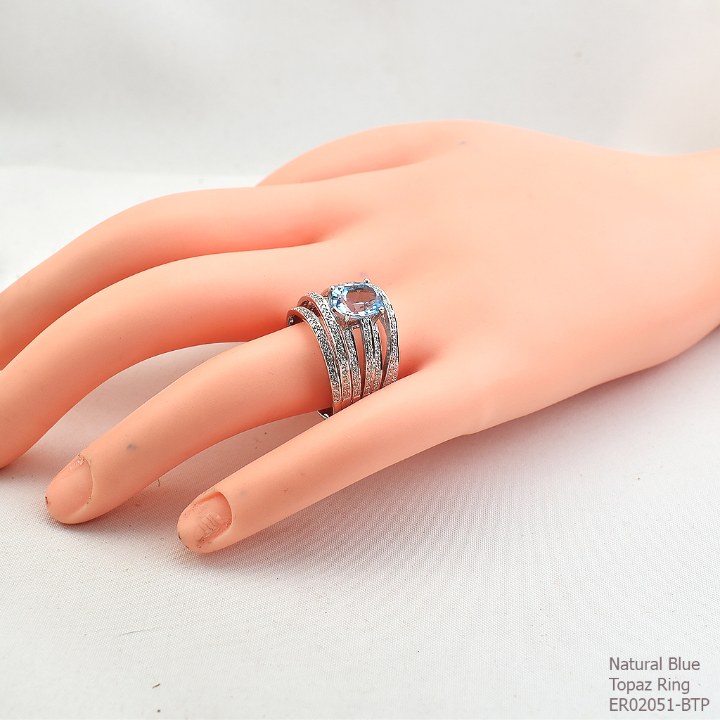 SKJewelryFactory แหวนพลอยบลูโทปาซแท้และเพชร ตัวเรือนเงินแท้ ดีไซน์เก๋ๆเพชรแถว เล่นระดับสูงต่ำ ER02051-BTP