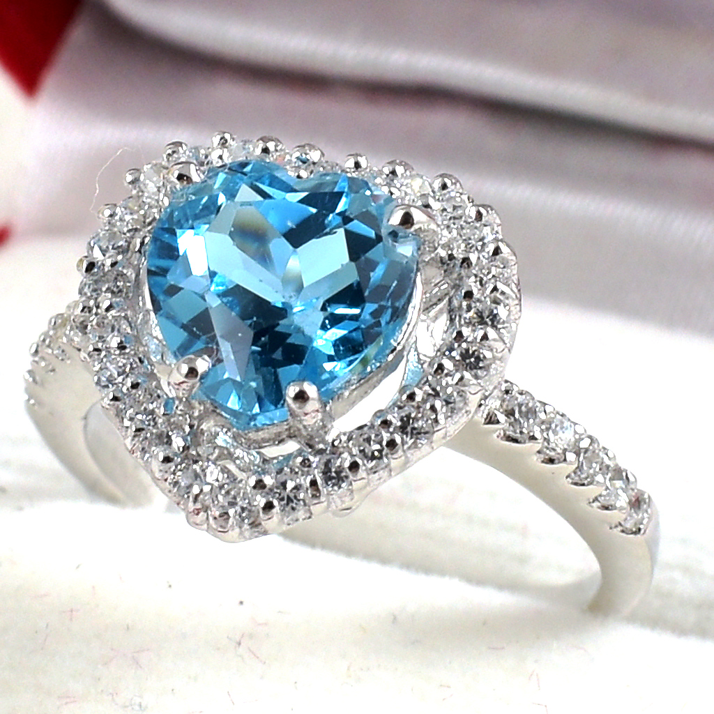SKJewelryfactory แหวหัวใจล้อมเพชร พลอยสวิสบลูโทปาซแท้ ER00982-SBT