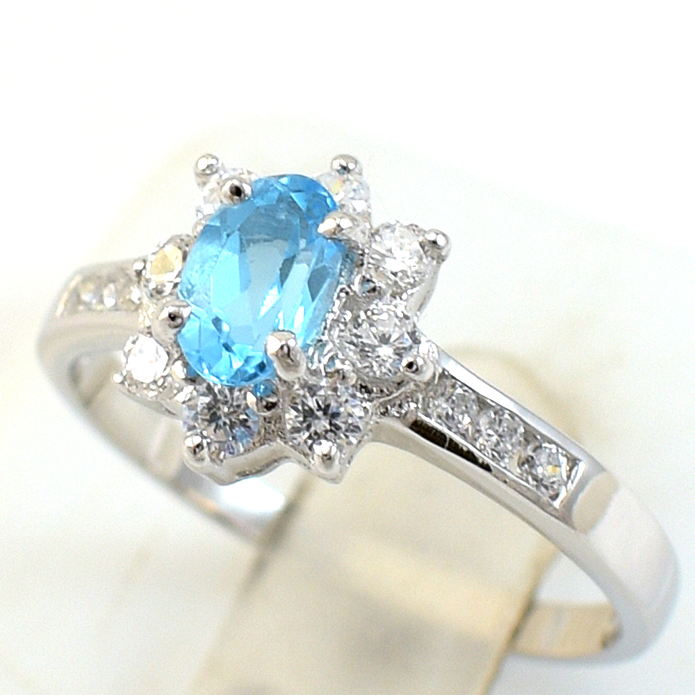 SKJewelryfactory แหวนพลอยสวิสบลูโทปาซแท้ แหวนพลอยล้อมเพชร ER00663-SBT