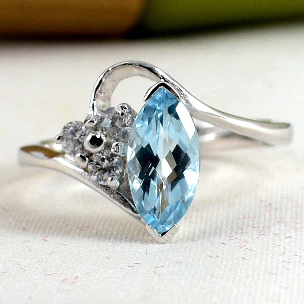 SKJewelryfactory แหวนมาร์คี พลอยรูปเม็ดข้าวสาร พลอยบลูโทปาซแท้ ER02350-BTP