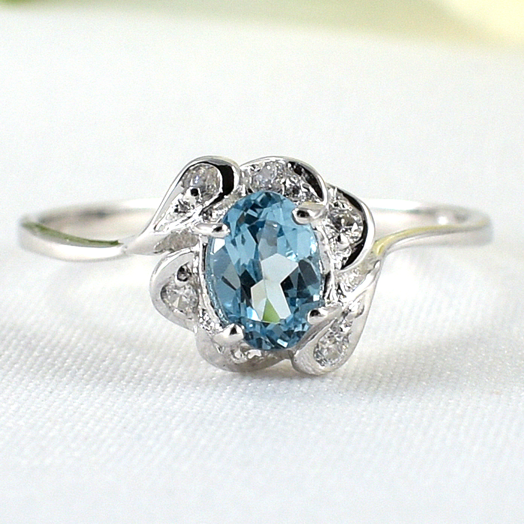 SKJewelryfactory แหวนเงินแท้ 92.5% ฝังพลอยสวิสบลูโทปาซแท้ ประดับเพชร ER01112-SBT