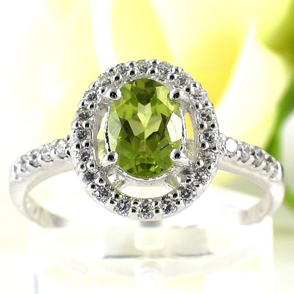 SKJewelryfactory แหวนเงินแท้ 92.5% ฝังพลอยเพอริดอทแท้ ล้อมเพชร ER02206-PDT