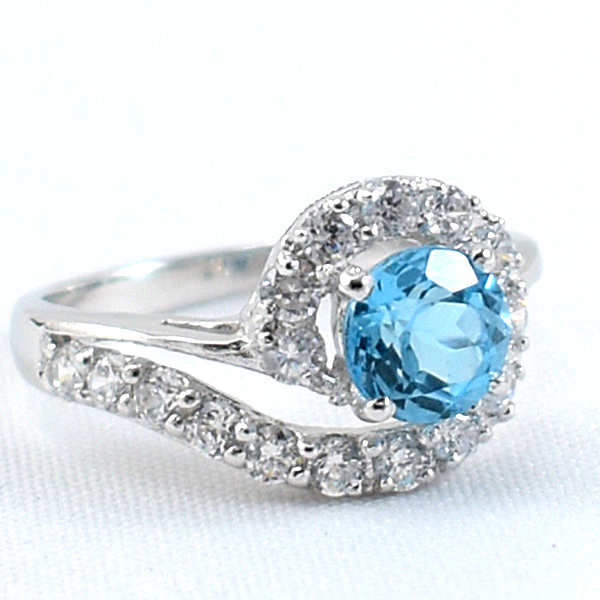 SKJewelryfactory แหวนเงินพลอยสวิสบลูโทปาซแท้ ล้อมเพฃร ER01644-SBT