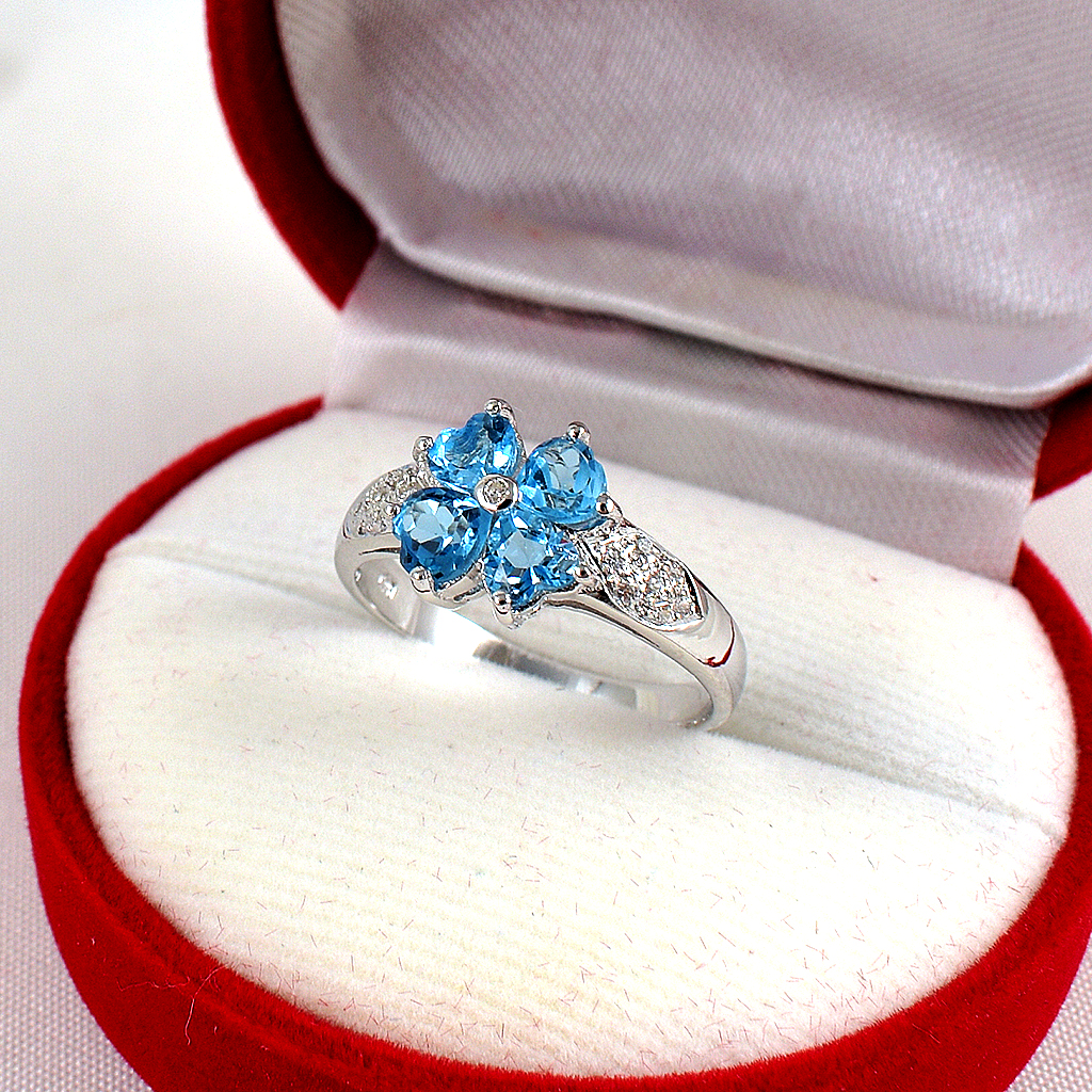 SKJewelryfactory แหวนเงินแท้ ฝังพลอยสวิสบลูโทปาซแท้ ทรงดอกไม้ ER00874-SBT