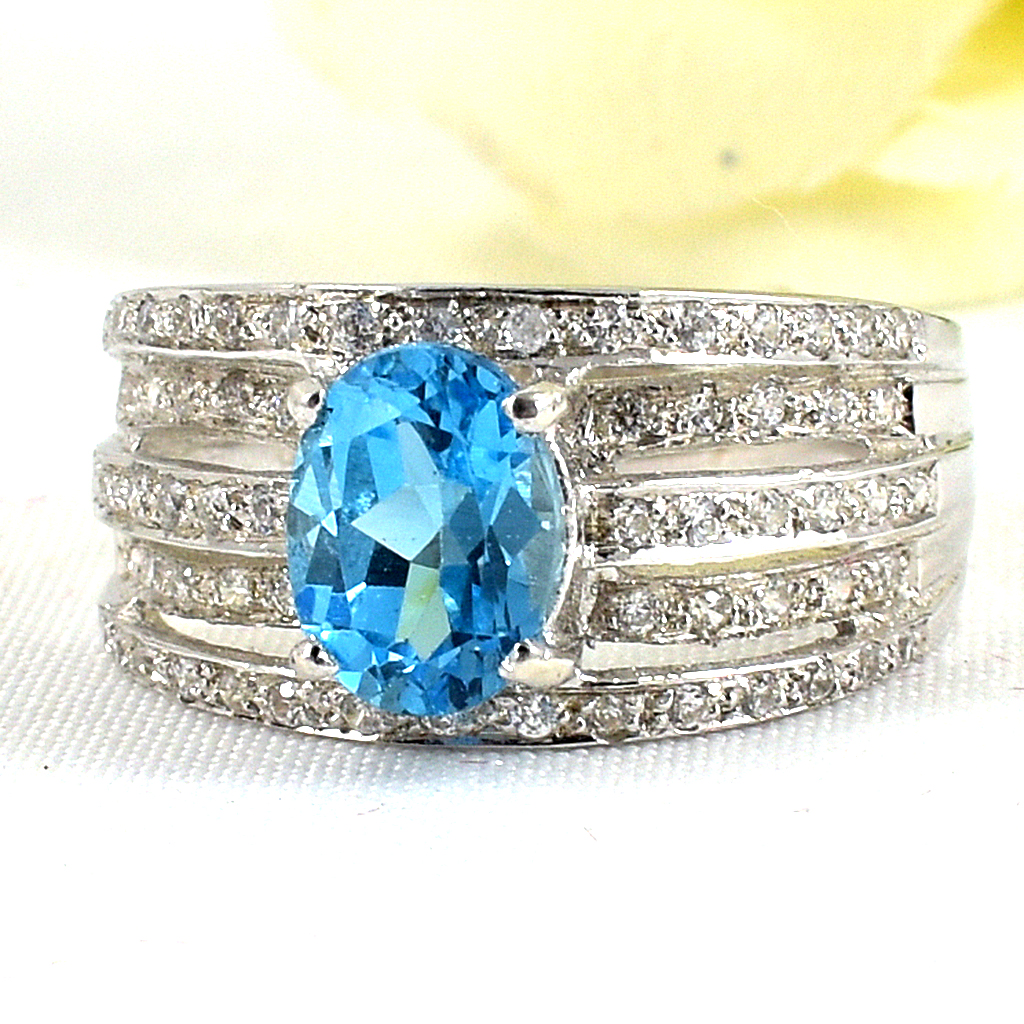 SKJewelryfactory แหวนเงินแท้ 92.5% ฝังพลอยสวิสบลูโทปาซแท้ สีฟ้าฉ่ำ สไตล์หรูหรา ER00919-SBT