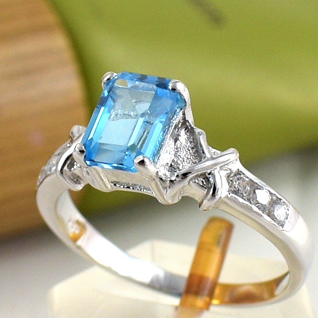 SKJewelryfactory แหวนเหลี่ยมพลอยสวิสบลูโทปาซแท้ ดีไซน์เรียบๆดูทันสมัย ER00792-SBT