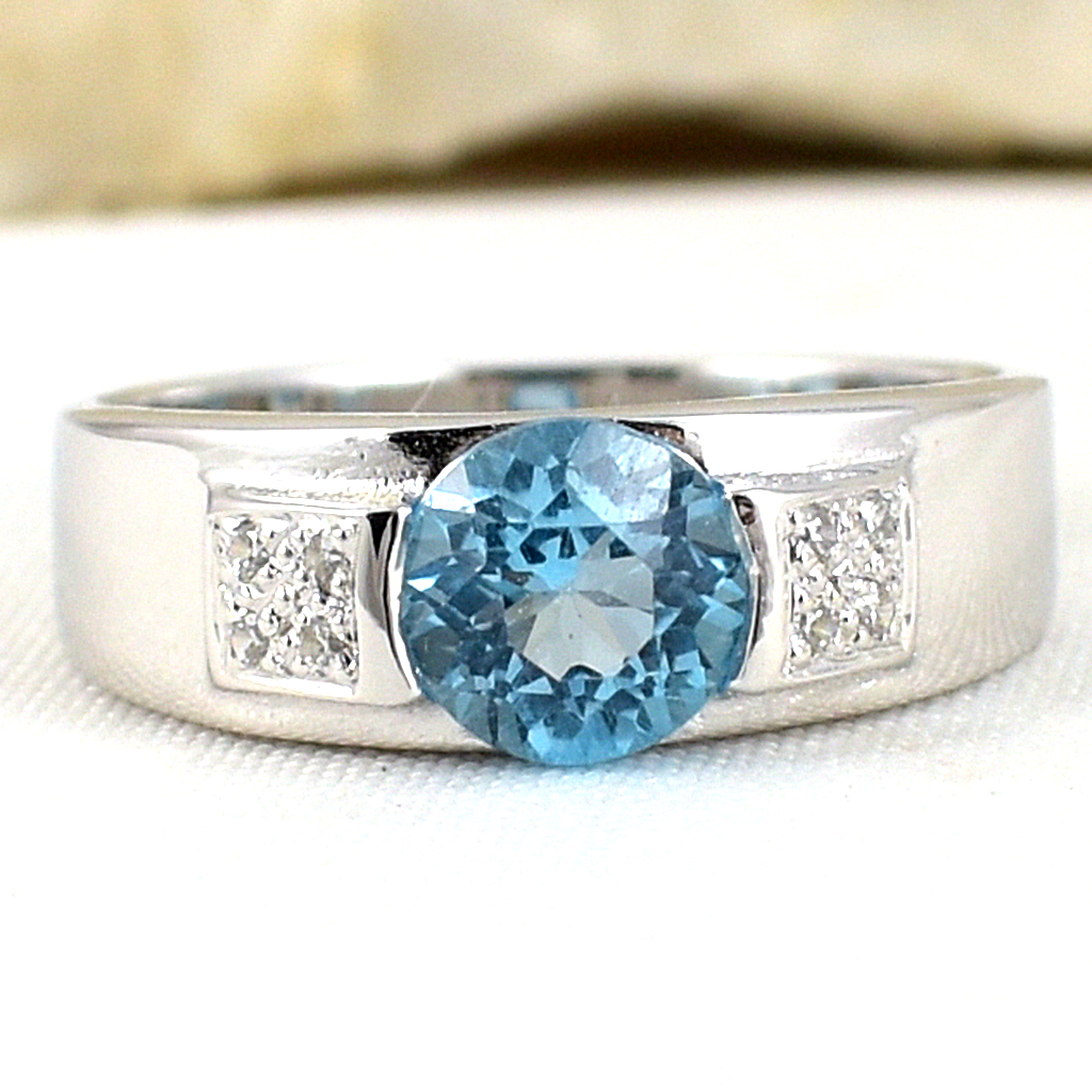 SKJewelryfactory แหวนเงินแท้ 92.5% ฝังพลอยสวิสบลูโทปาซแท้ รูปแบบออกแนวสปอต ER00890-SBT