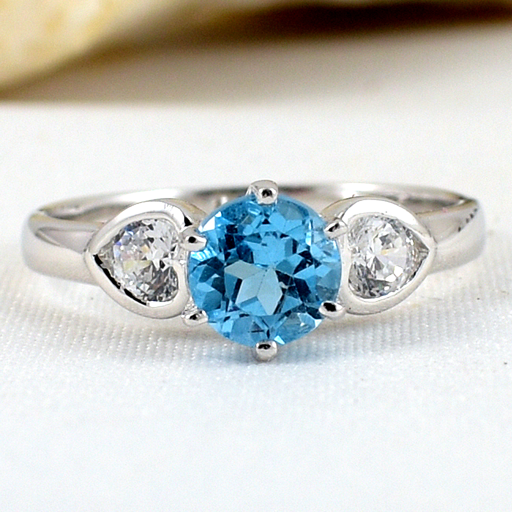 SKJewelryfactory แหวนเงินแท้ ฝังพลอยสวิสบลูโทปาซแท้ สไตล์น่ารัก ER00349-SBT