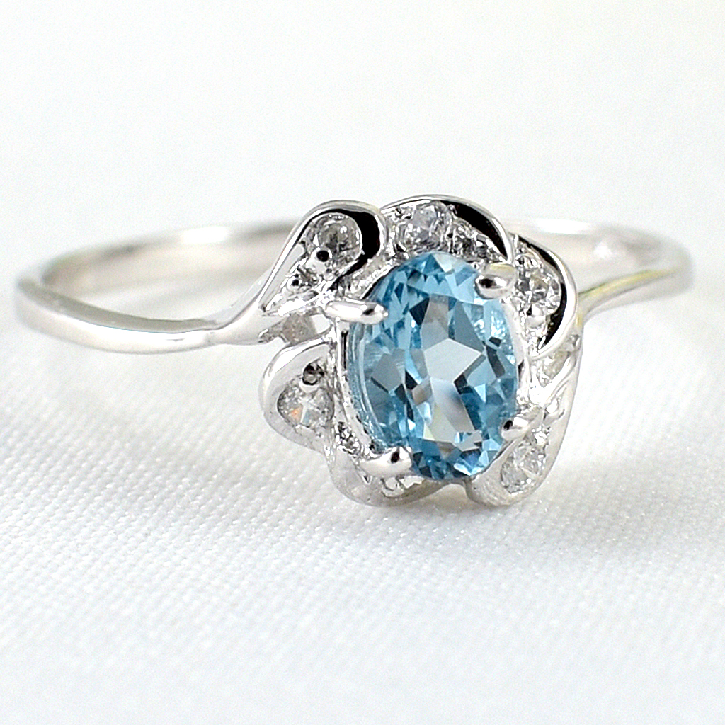 SKJewelryfactory แหวนเงินแท้ 92.5% ฝังพลอยสวิสบลูโทปาซแท้ ประดับเพชร ER01112-SBT