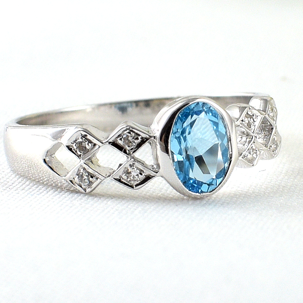 SKJewelryfactory แหวนเงินแท้ ฝังพลอยโทปาซแท้ ดีไซน์เรียบหรู ER01402-SBT