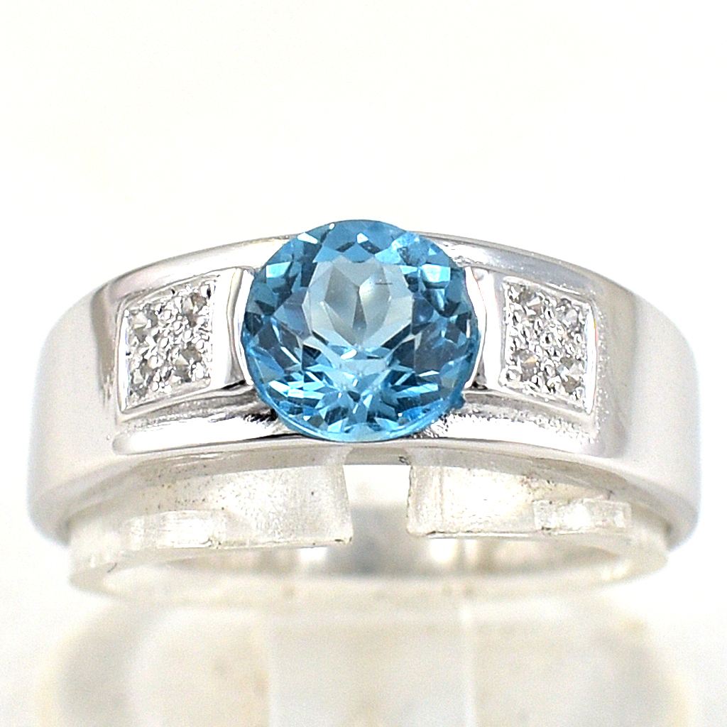 SKJewelryfactory แหวนเงินแท้ 92.5% ฝังพลอยสวิสบลูโทปาซแท้ รูปแบบออกแนวสปอต ER00890-SBT
