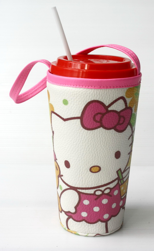 แก้วเก็บความเย็น สะดวกสบายด้วยหูหิ้ว ลาย Hello Kitty ดอกทานตะวัน บนพื้นขาว เก็บความเย็นได้กว่า 5 ชั่วโมง