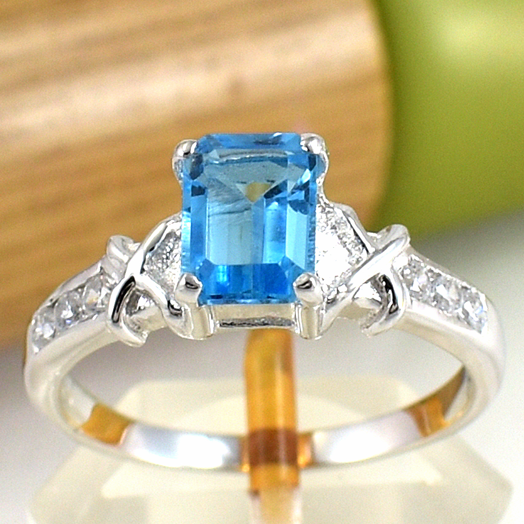 SKJewelryfactory แหวนเหลี่ยมพลอยสวิสบลูโทปาซแท้ ดีไซน์เรียบๆดูทันสมัย ER00792-SBT