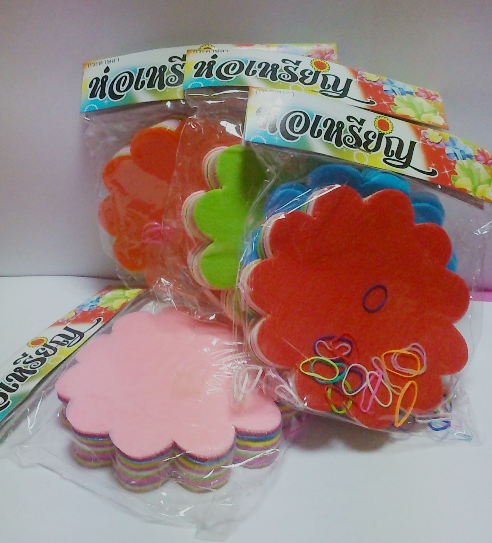 กระดาษห่อเหรียญโปรยทาน