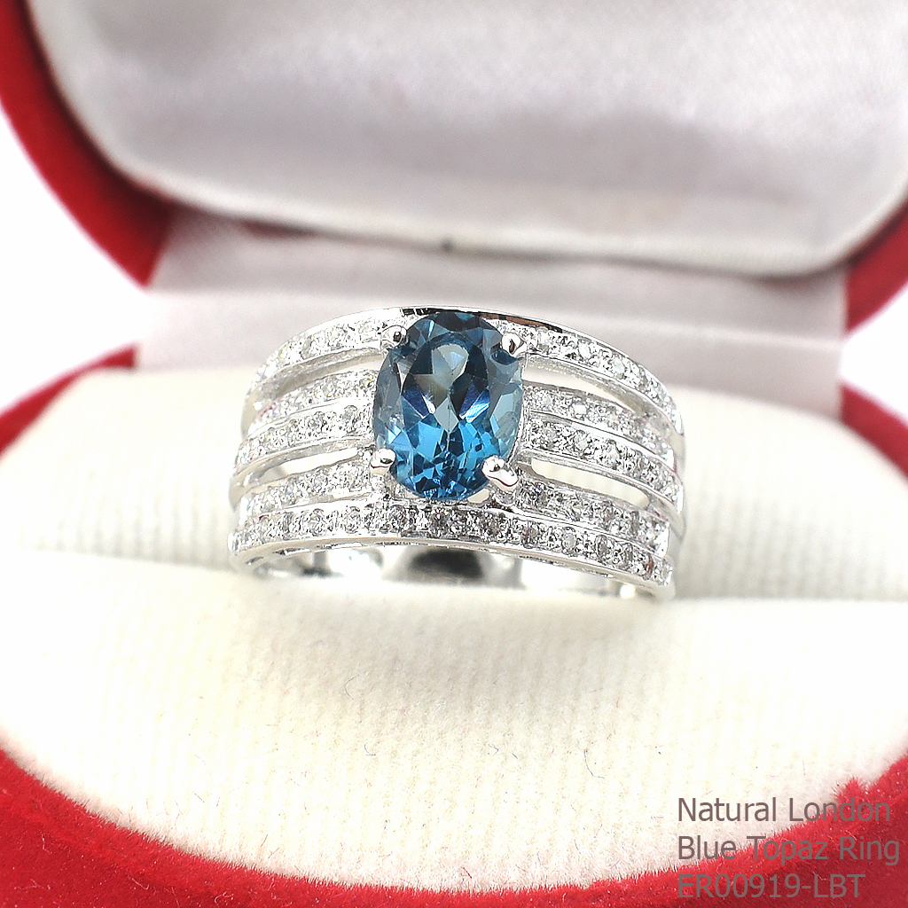 SKJewelryfactory แหวนพลอยแท้ ดีไซส์เพชร 5 แถว ประดับยอดด้วย พลอยลอนดอนบลูโทปาซแท้ ER00919-LBT