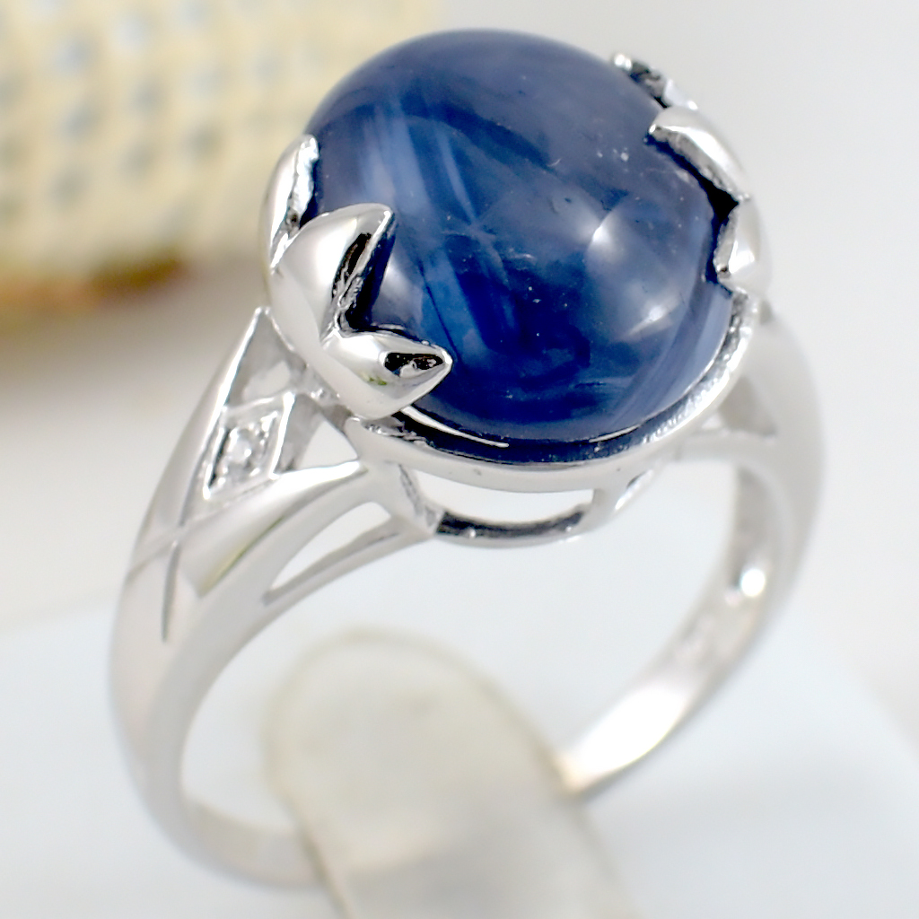 SKJewelryfactory แหวนเงินแท้ 92.5% ฝังพลอยไพลินแท้ ทรงกลม(หายาก) ER01732-BSC