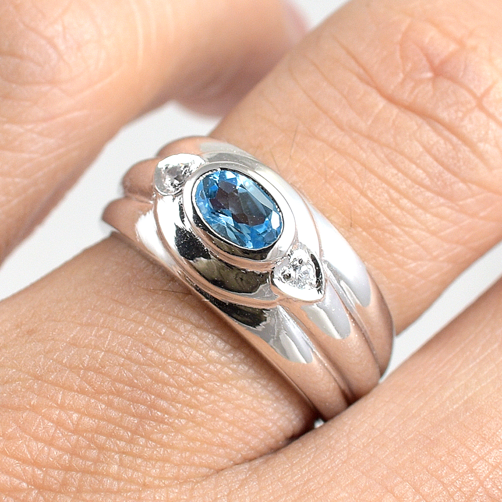 SKJewelryFactory แหวนสไตล์แหวนปลอกมีด พลอยสวิสบลูโทปาซแท้และเพชร ER00829-SBT