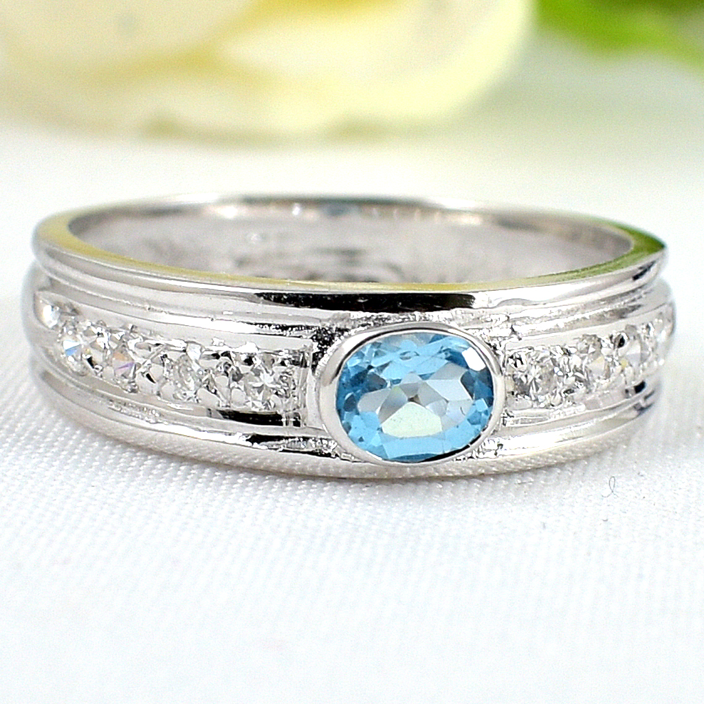 SKJewelryfactory แหวนเงินแท้ ฝังพลอยสวิสบลูโทปาซแท้ ประดับด้วยเพชร ใส่ได้ทั้งผช.และผญ. ER02011-SBT