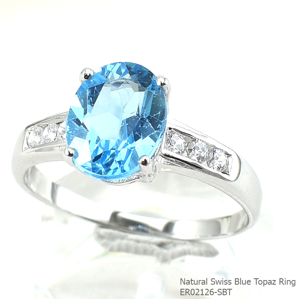 SKJewelryfactory แหวนเงินแท้ ฝังพลอยสวิสบลูโทปาซแท้ ชูพลอยโดดเด่น พร้อมประดับด้วยเพชร ER02126-SBT