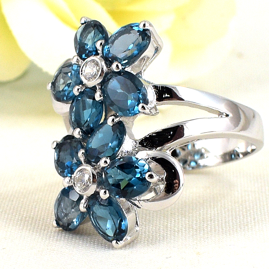 SKJewelryfactory แหวนดอกไม้ พลอยลอนดอนบลูโทปาซแท้ สีฟ้าเข้ม ER00233-LBT