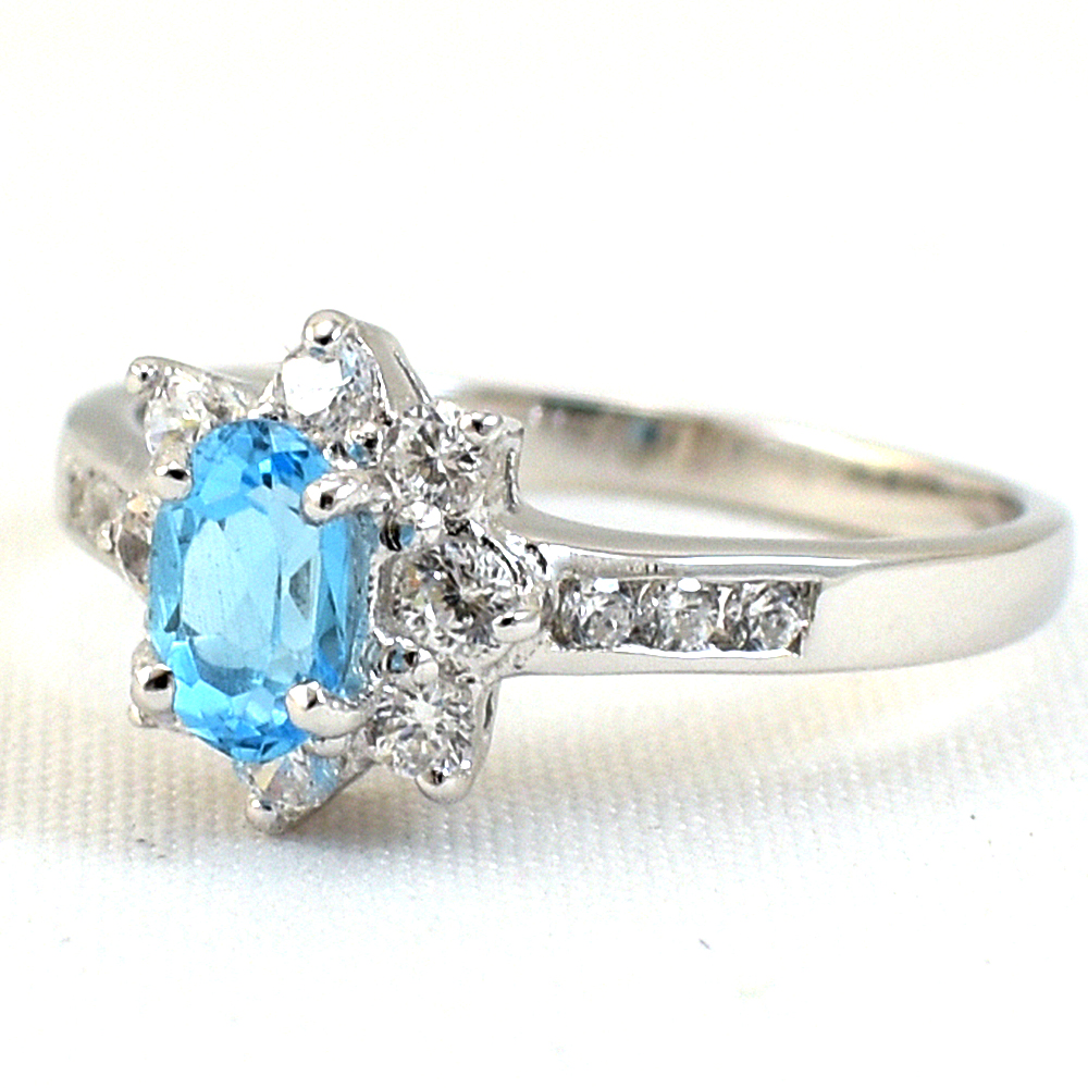 SKJewelryfactory แหวนพลอยสวิสบลูโทปาซแท้ แหวนพลอยล้อมเพชร ER00663-SBT