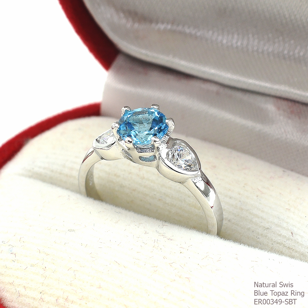 SKJewelryfactory แหวนเงินแท้ ฝังพลอยสวิสบลูโทปาซแท้ สไตล์น่ารัก ER00349-SBT
