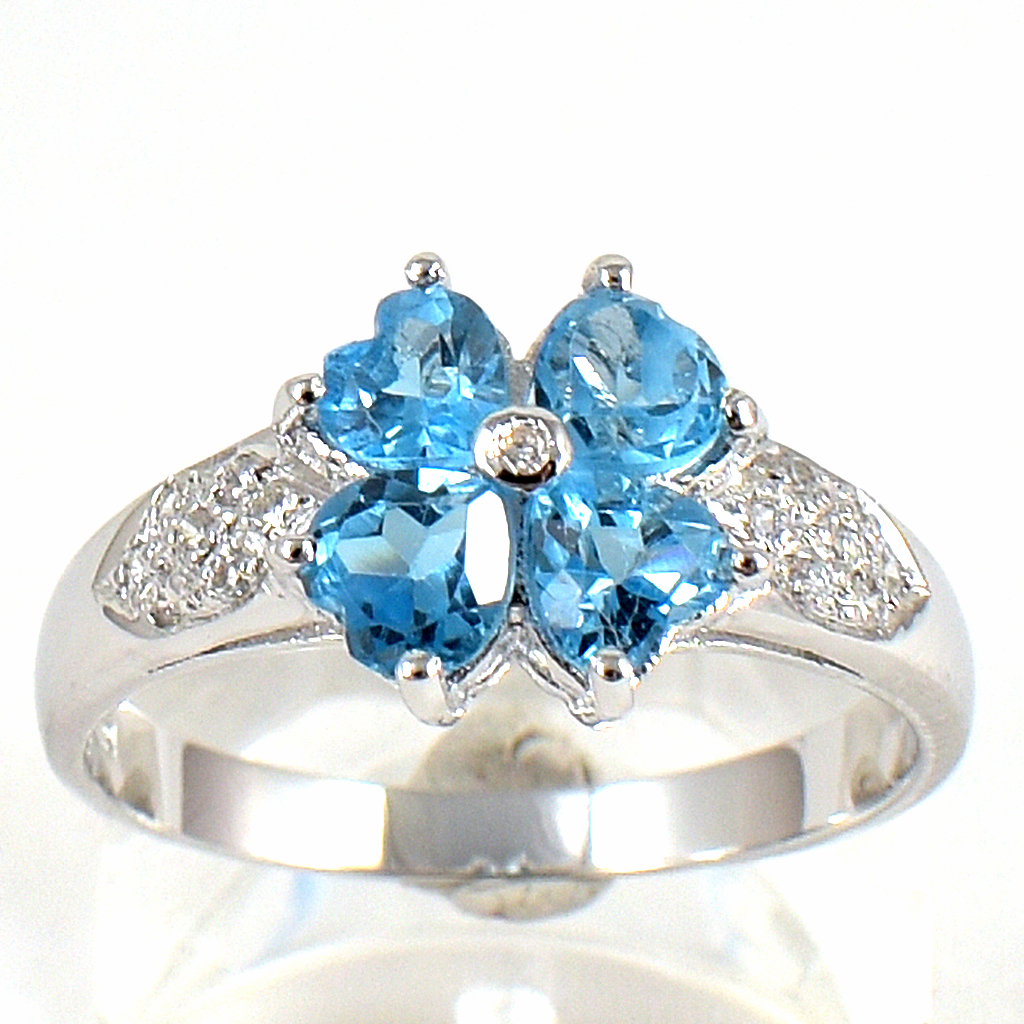 SKJewelryfactory แหวนเงินแท้ ฝังพลอยสวิสบลูโทปาซแท้ ทรงดอกไม้ ER00874-SBT