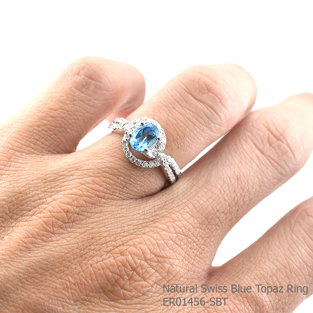 SKJewelryfactory แหวนพลอยสวิสบลูโทปาซแท้ ประดับด้วยเพชรหรูหรา ER01456-SBT