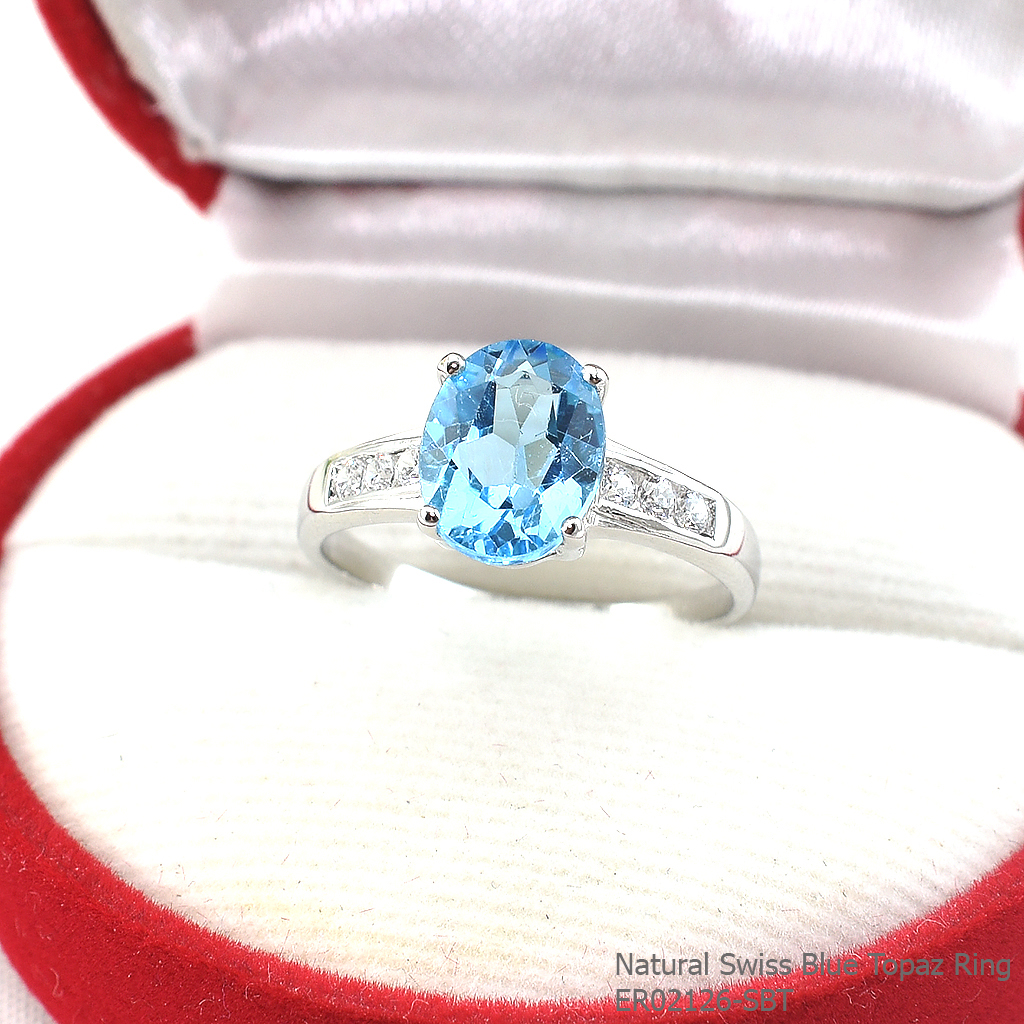 SKJewelryfactory แหวนเงินแท้ ฝังพลอยสวิสบลูโทปาซแท้ ชูพลอยโดดเด่น พร้อมประดับด้วยเพชร ER02126-SBT