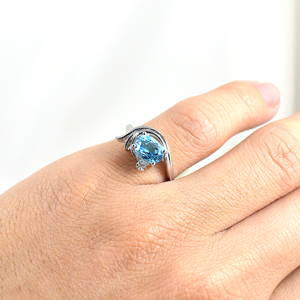 SKJewelryfactory แหวนเงินแท้ 92.5% ฝังพลอยสวิสบลูโทปาซแท้ ดีไซด์สวยเก๋ ไม่เหมือนใคร ER01446-SBT
