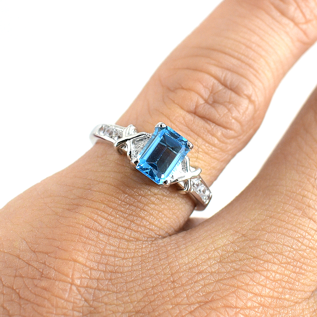 SKJewelryfactory แหวนเหลี่ยมพลอยสวิสบลูโทปาซแท้ ดีไซน์เรียบๆดูทันสมัย ER00792-SBT