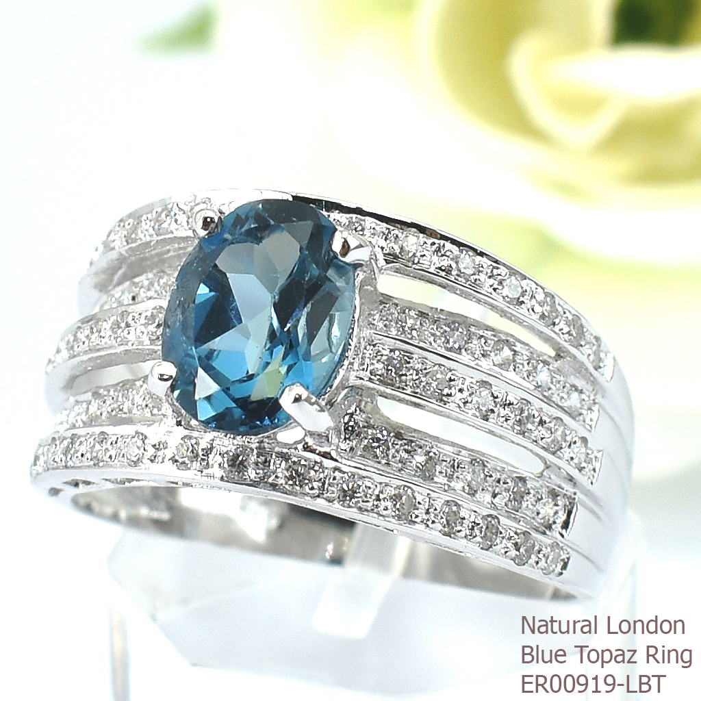 SKJewelryfactory แหวนพลอยแท้ ดีไซส์เพชร 5 แถว ประดับยอดด้วย พลอยลอนดอนบลูโทปาซแท้ ER00919-LBT