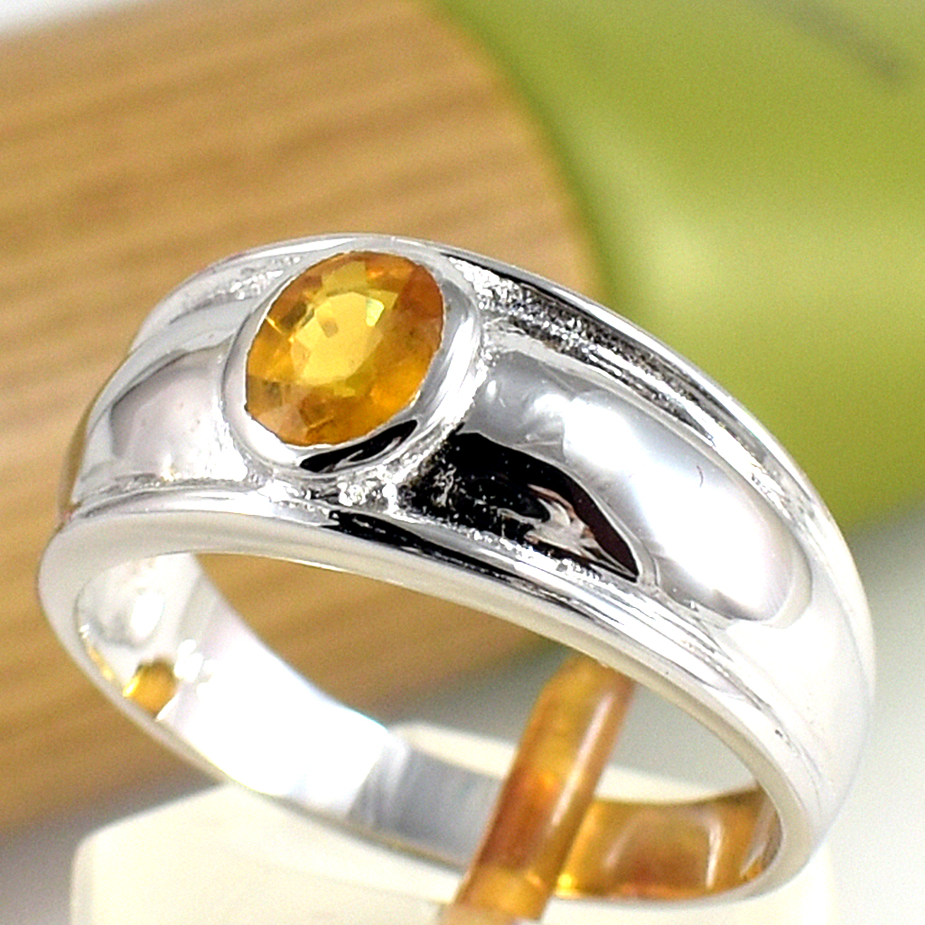 SKJewelryFactory แหวนบุษราคัมแท้ ดีไซน์แหวนปลอกมีด สีแตกต่างกันออกไปตามธรรมชาติของพลอยแต่ละเม็ด ER00085-YSA