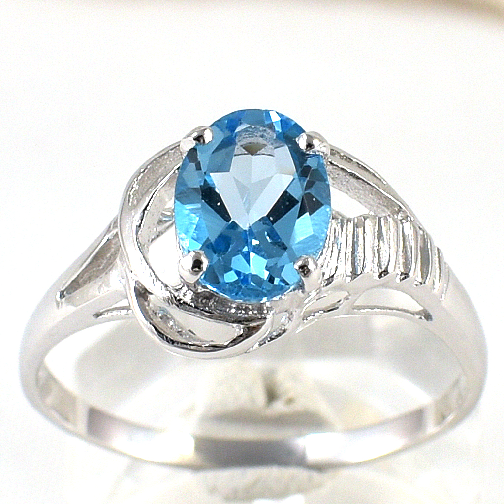 SKJewelryfactory แหวนเม็ดเดี่ยว พลอยสวิสบลูโทปาซแท้ เน้นโชว์ความโดดเด่นของตัวพลอย ER00027-SBT
