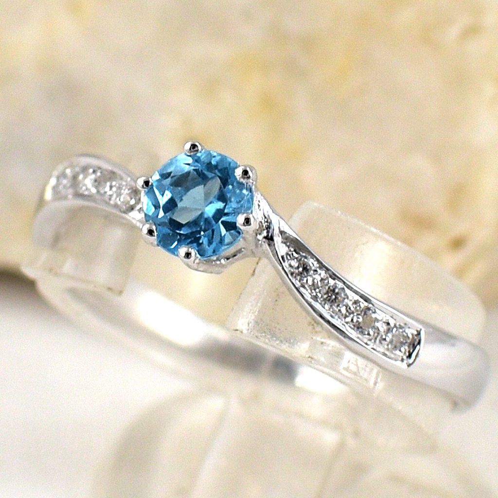 SKJewelryfactory แหวนเงินแท้ 92.5% ฝังพลอยสวิสบลูโทปาซแท้ สไตล์น่ารัก ER02130-SBT