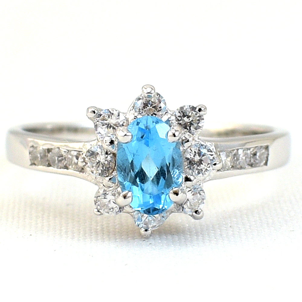 SKJewelryfactory แหวนพลอยสวิสบลูโทปาซแท้ แหวนพลอยล้อมเพชร ER00663-SBT