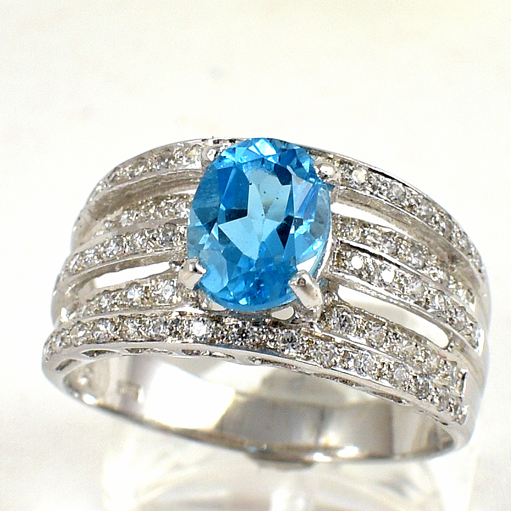 SKJewelryfactory แหวนเงินแท้ 92.5% ฝังพลอยสวิสบลูโทปาซแท้ สีฟ้าฉ่ำ สไตล์หรูหรา ER00919-SBT