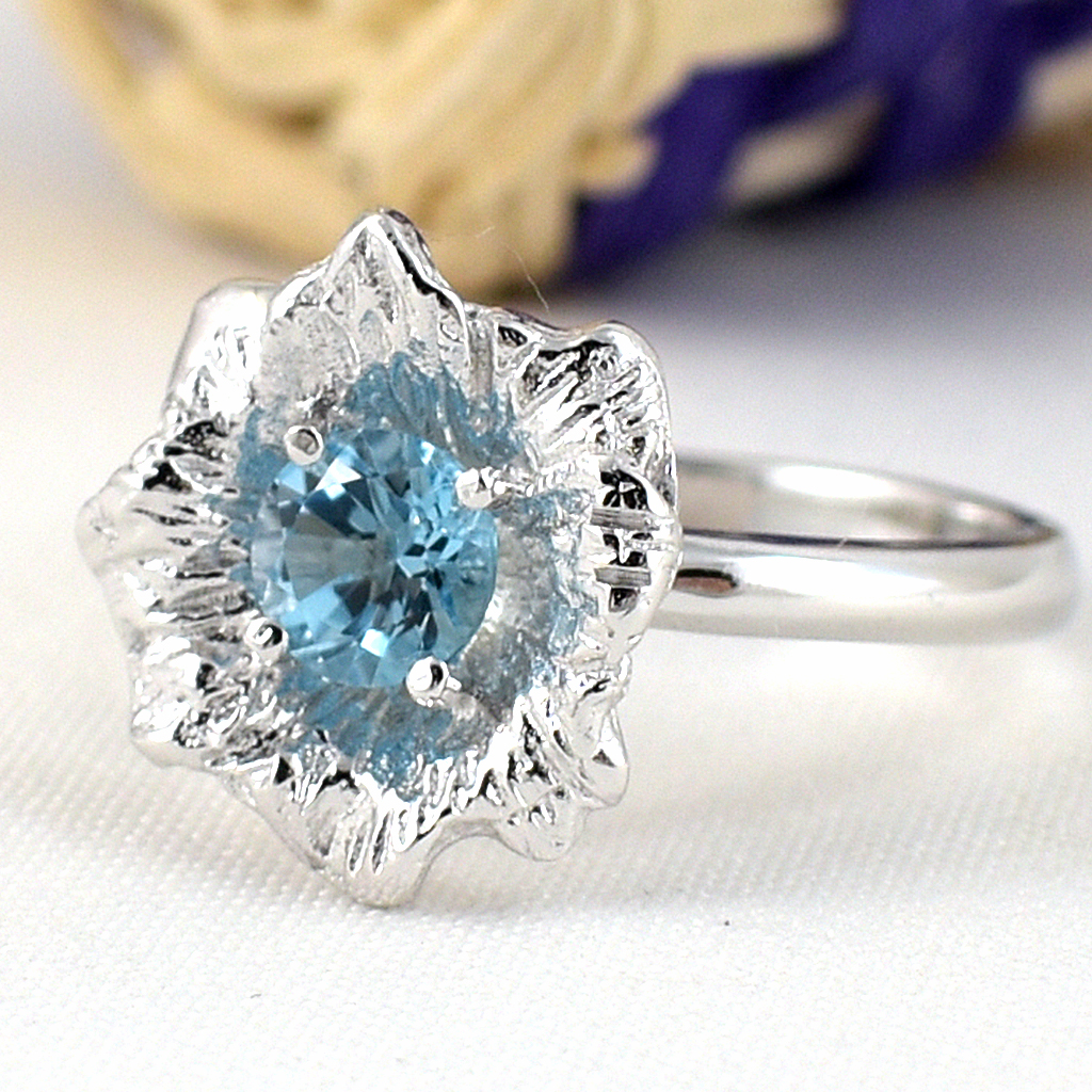 SKJewelryfactory แหวนดอกไม้ พลอยสวิสบลูโทปาซแท้ ER02240-SBT