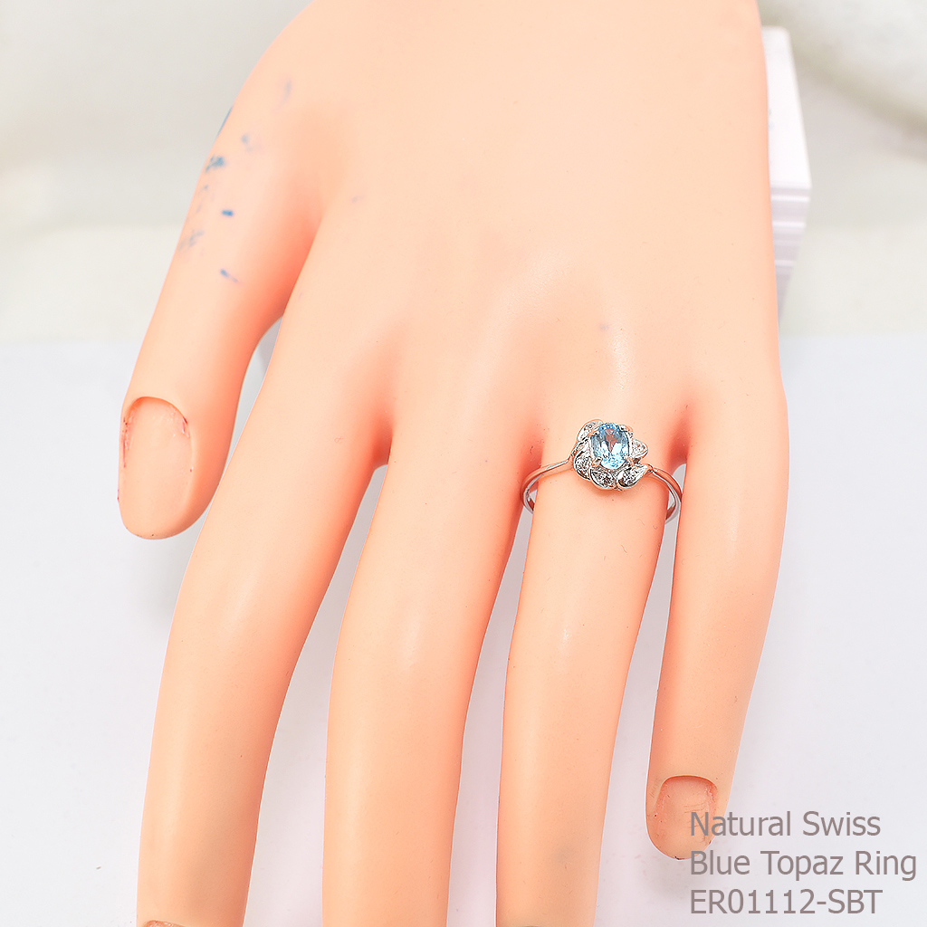 SKJewelryfactory แหวนเงินแท้ 92.5% ฝังพลอยสวิสบลูโทปาซแท้ ประดับเพชร ER01112-SBT