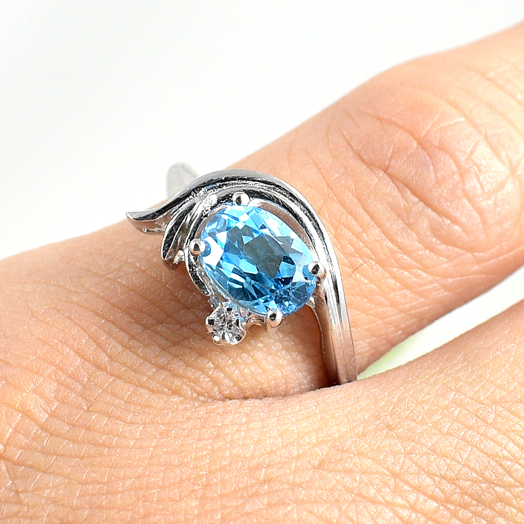 SKJewelryfactory แหวนเงินแท้ 92.5% ฝังพลอยสวิสบลูโทปาซแท้ ดีไซด์สวยเก๋ ไม่เหมือนใคร ER01446-SBT