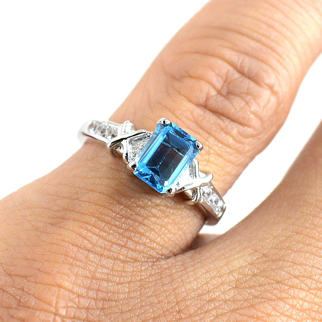 SKJewelryfactory แหวนเหลี่ยมพลอยสวิสบลูโทปาซแท้ ดีไซน์เรียบๆดูทันสมัย ER00792-SBT