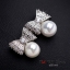 WT073 ตุ้มหู ต่างหูสีเงิน รูปโบว์ ประดับด้วยไข่มุข สวยหวาน ขนาด 1 cm.