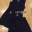 เสื้อผ้าเกาหลี พร้อมส่ง เพลย์สูท ขาสั้นสีขาว-ดำติดพินมุก
