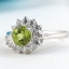 SKJewelryfactory แหวนเงินแท้ ฝังพลอยเพอริดอทแท้ล้อมเพชร ER01643-PDT