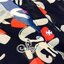 พร้อมส่ง เสื้อพิมพ์ลายอักษรและรูปหัวในพื้นดำ