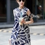 พร้อมส่ง Mini dress แขนกุด กระดุมหน้า ลายใบไม้